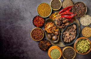 Assortment of heart-healthy spices including turmeric, cinnamon, and ginger