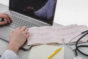 Doctor examining ECG report